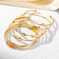Golden Minimalist Bracelet Set by Suryatra