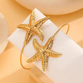 Golden Starfish Arm Cuff by Suryatra