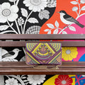 Prism Arc Geometric Envelope Sling Bag by Suryatra