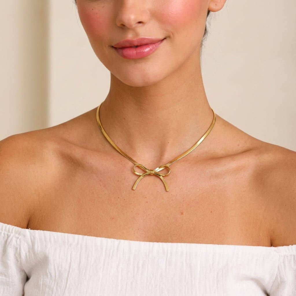 Golden Ribbon Bow Necklace By Suryatra