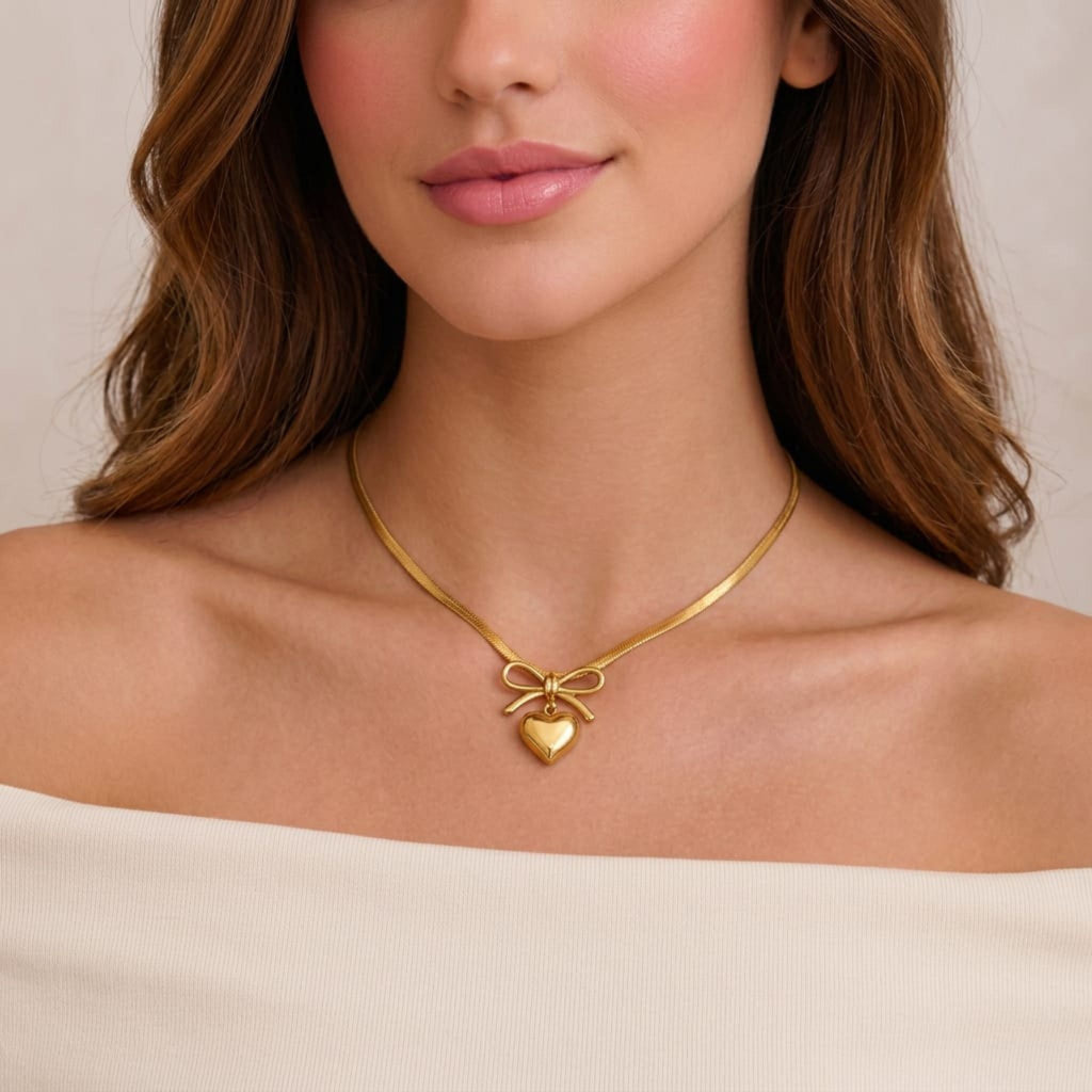 Golden Heart Bow Pendant Necklace By Suryatra