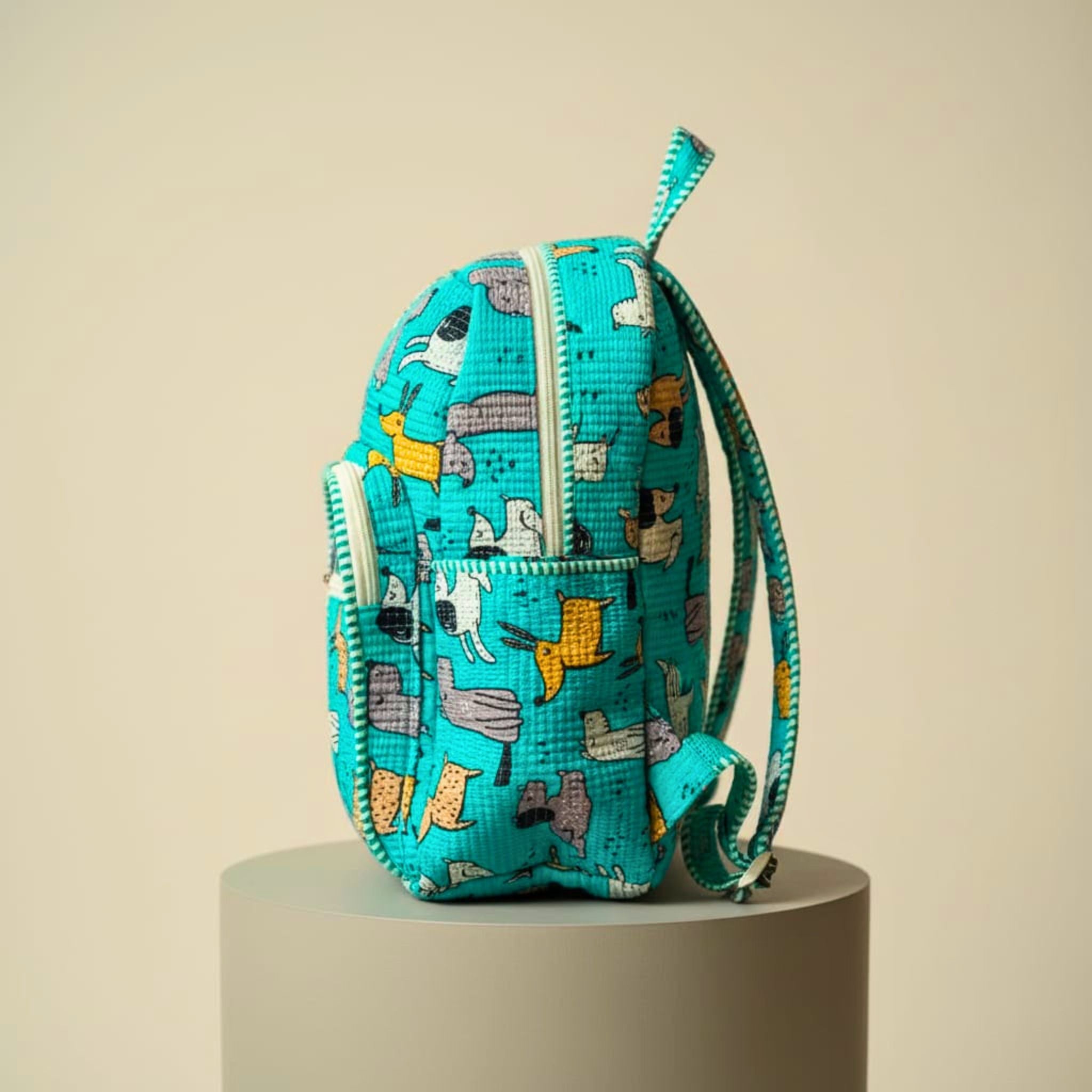 Dog Print Quilted Backpack by Suryatra