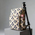 Floral Print Quilted Backpack by Suryatra