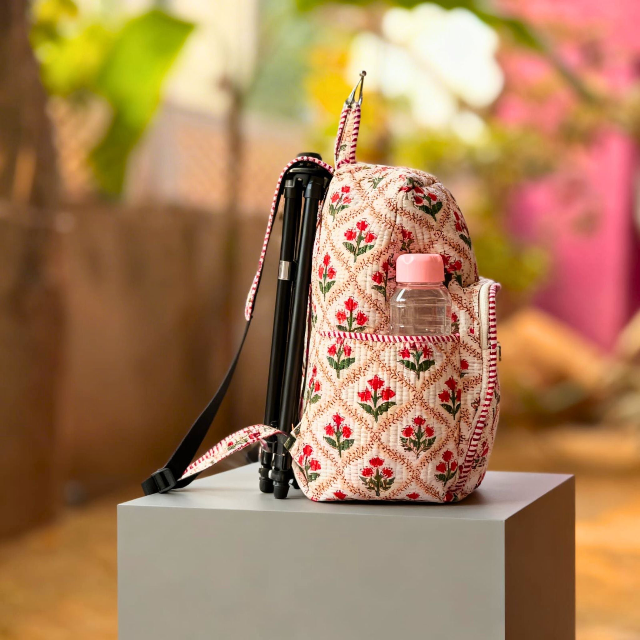 Red Floral Quilted Backpack by Suryatra