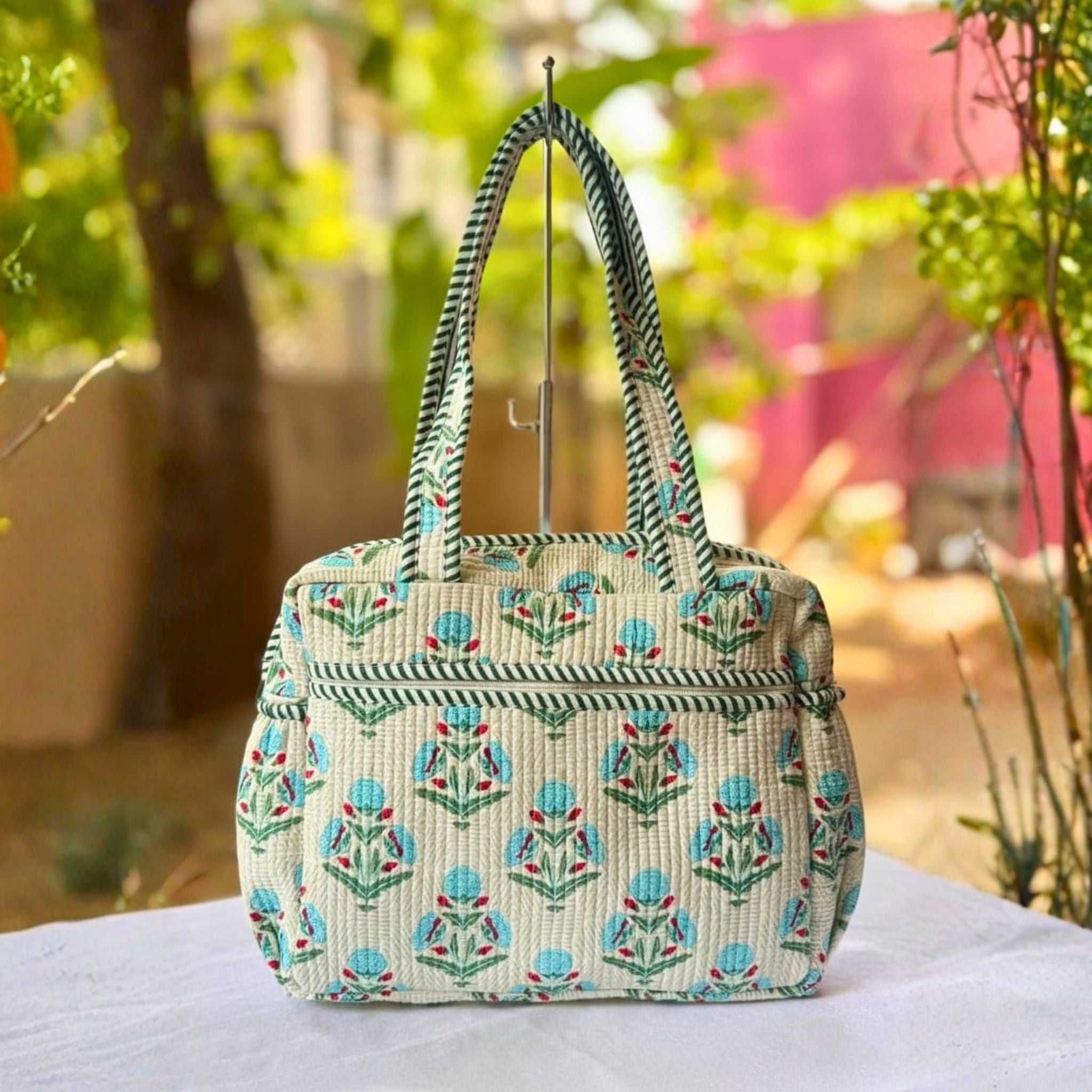 Handcrafted Floral Quilted Bag by Suryatra