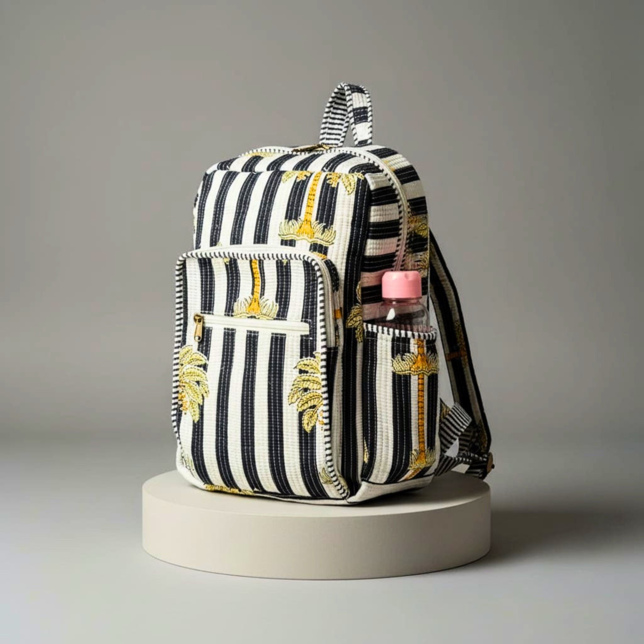 Striped Floral Quilted Backpack by Suryatra