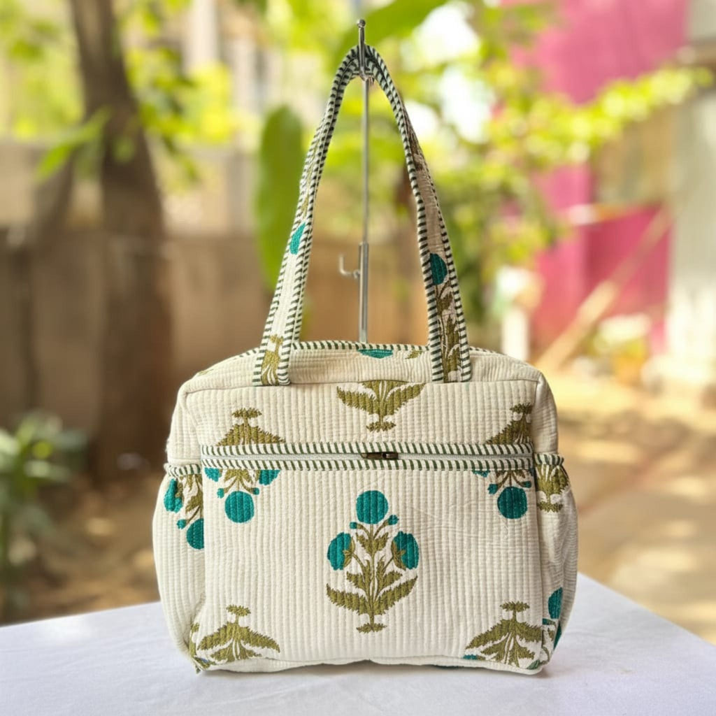 Green Floral Quilted Handbag by Suryatra