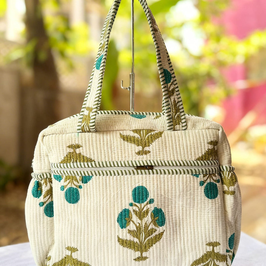 Green Floral Quilted Handbag by Suryatra