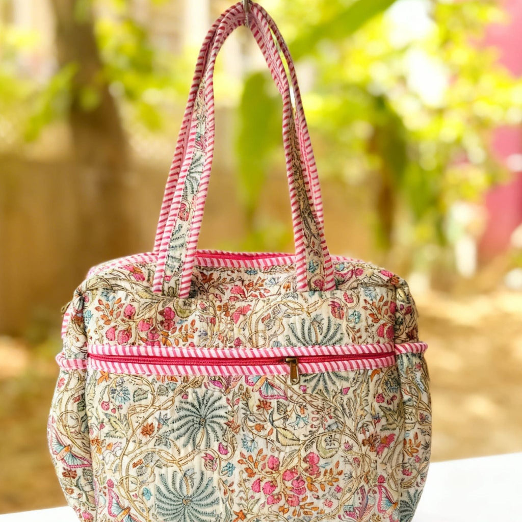 Pink Floral Quilted Handbag by Suryatra