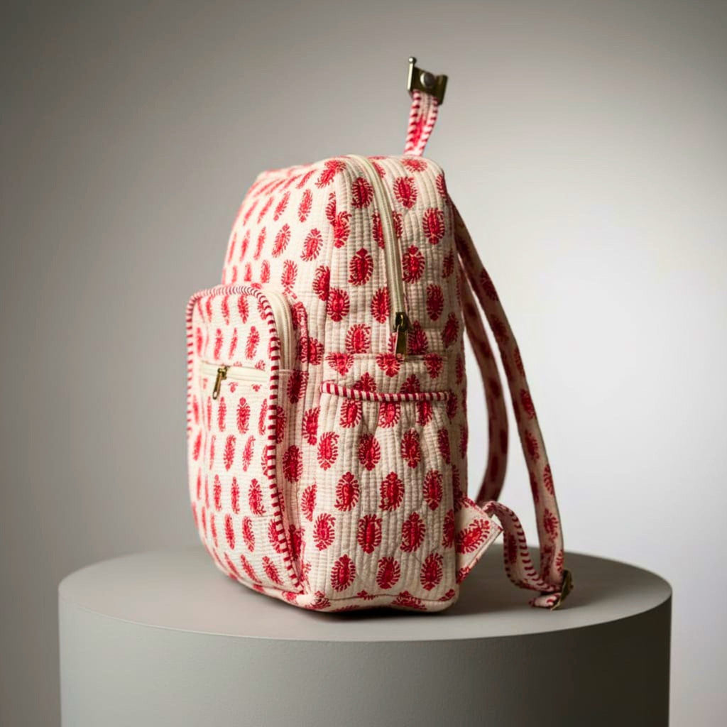 Red Ethnic Print Quilted Backpack by Suryatra